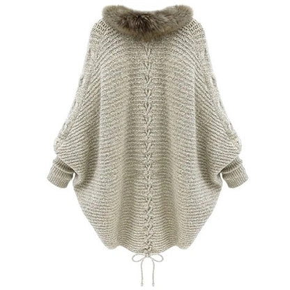 Le pull cardigan à col avec manches chauve-souris.
