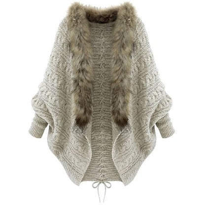 Le pull cardigan à col avec manches chauve-souris.