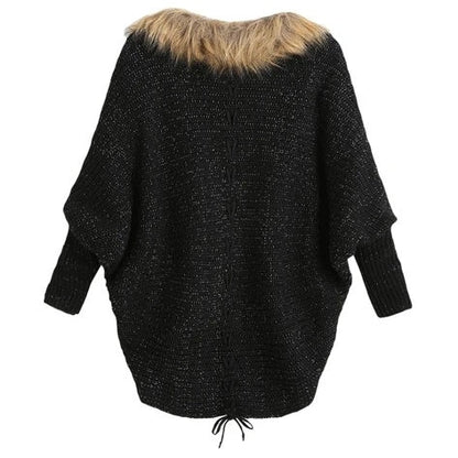 Le pull cardigan à col avec manches chauve-souris.
