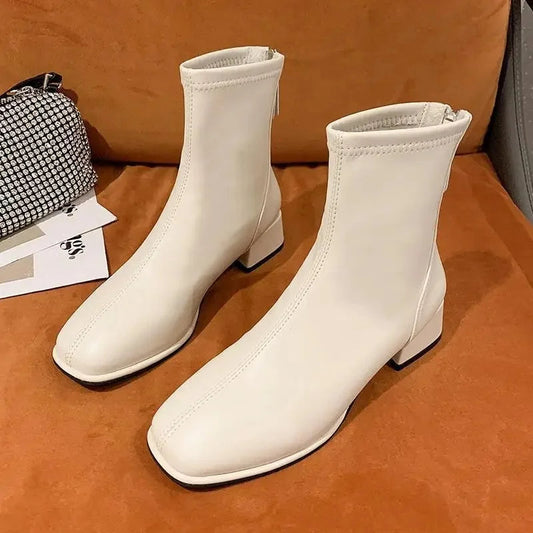Bottes à talon en cuir souple