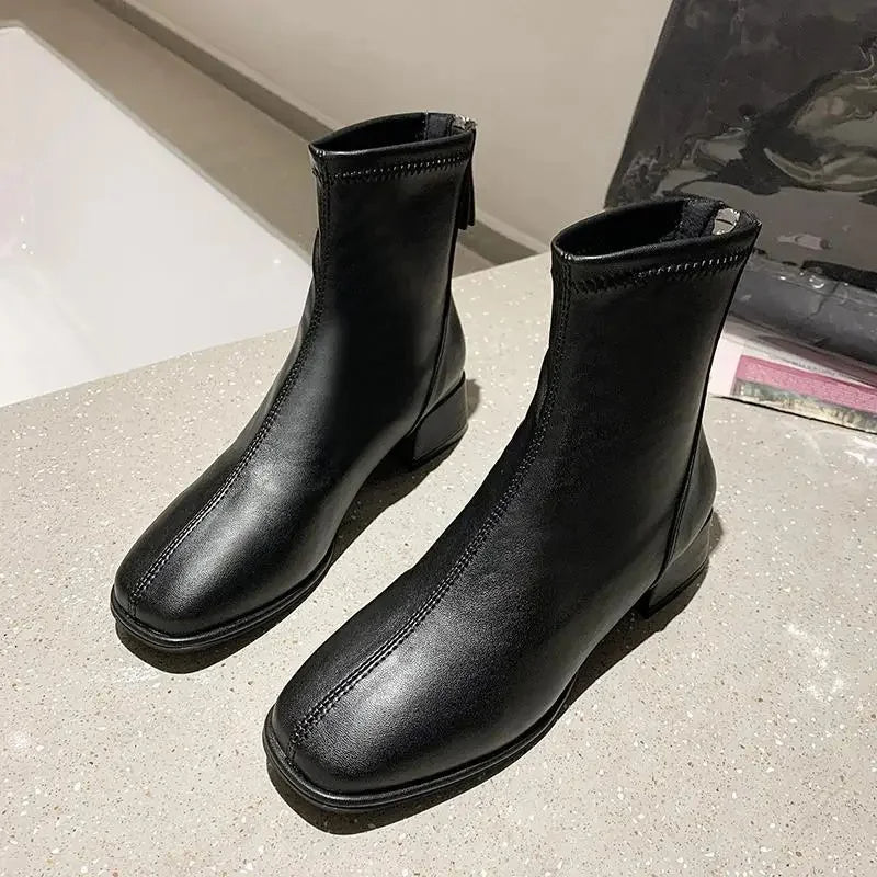 Bottes à talon en cuir souple