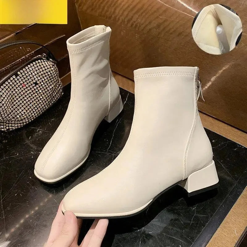 Bottes à talon en cuir souple